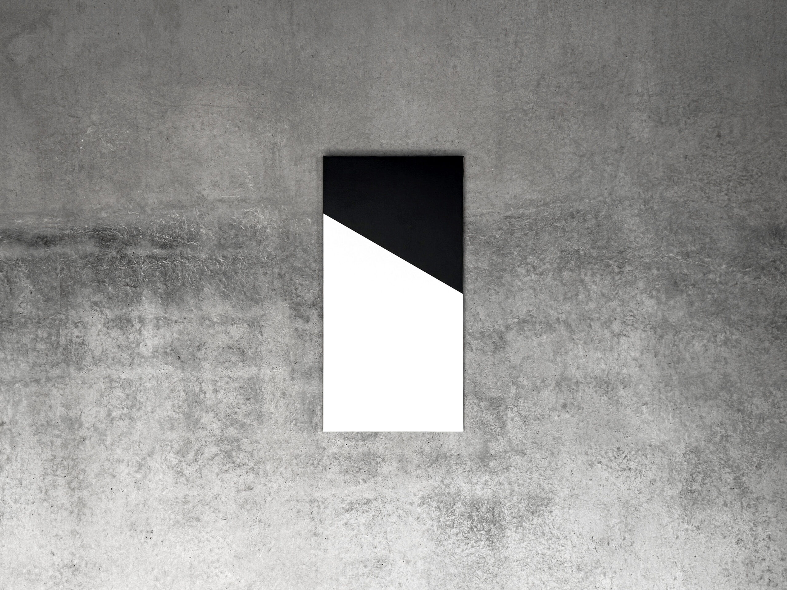 Vertical geometric black and white painting by Jean-Charles Kien on a raw concrete background.