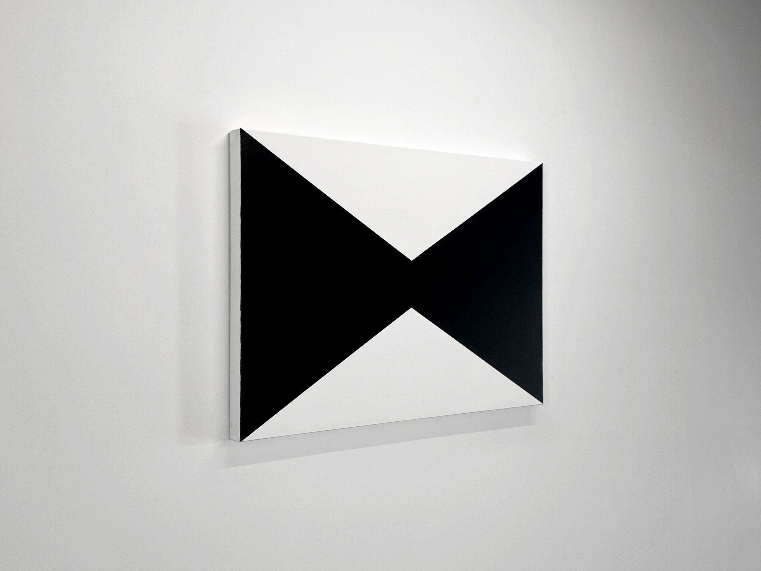 Perspective side angle view of Jean-Charles Kien's minimal horizontal rectangular painting showcasing its profile on a gallery wall.
